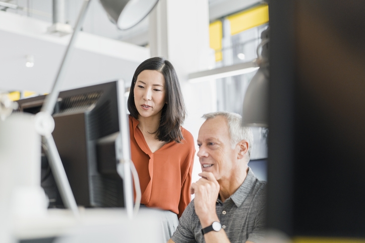 people looking at computer screen